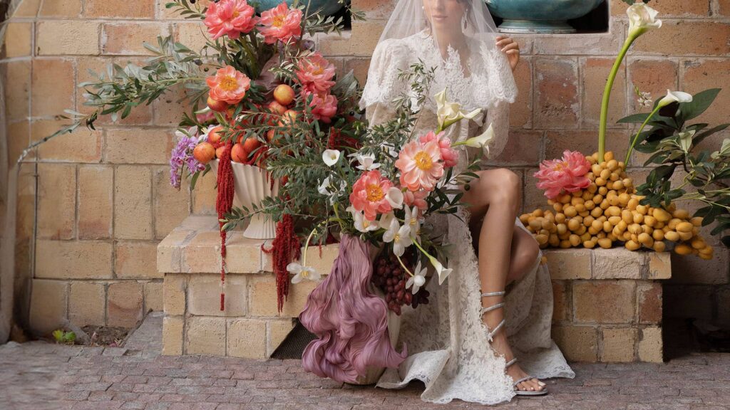 Iranian bride holding a bouquet during a traditional Persian wedding celebration