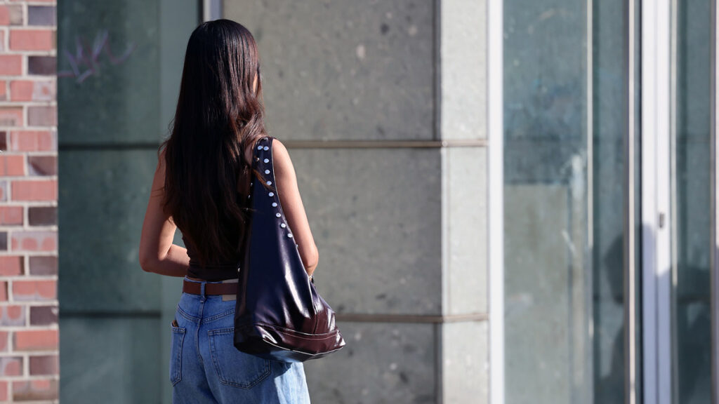 Iranian woman walking in a modern European city