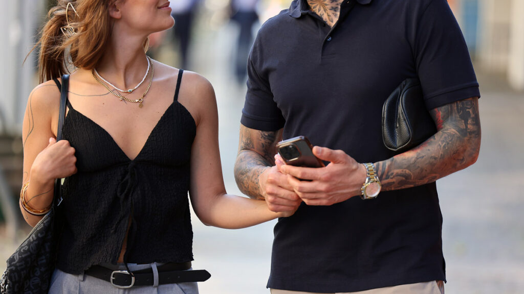 Persian couple walking together in Germany