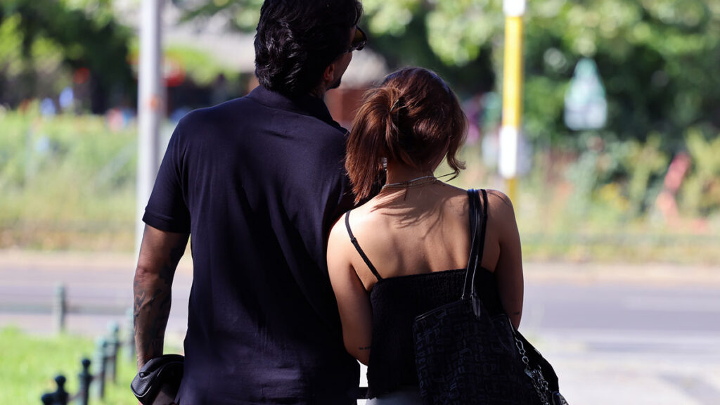 Couple walking together outdoors, representing ways Iranian singles can meet offline